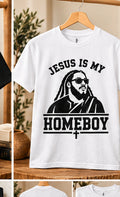 HolyTee's jesus is my homeboy shirt on wooden hanger in warm neutral studio